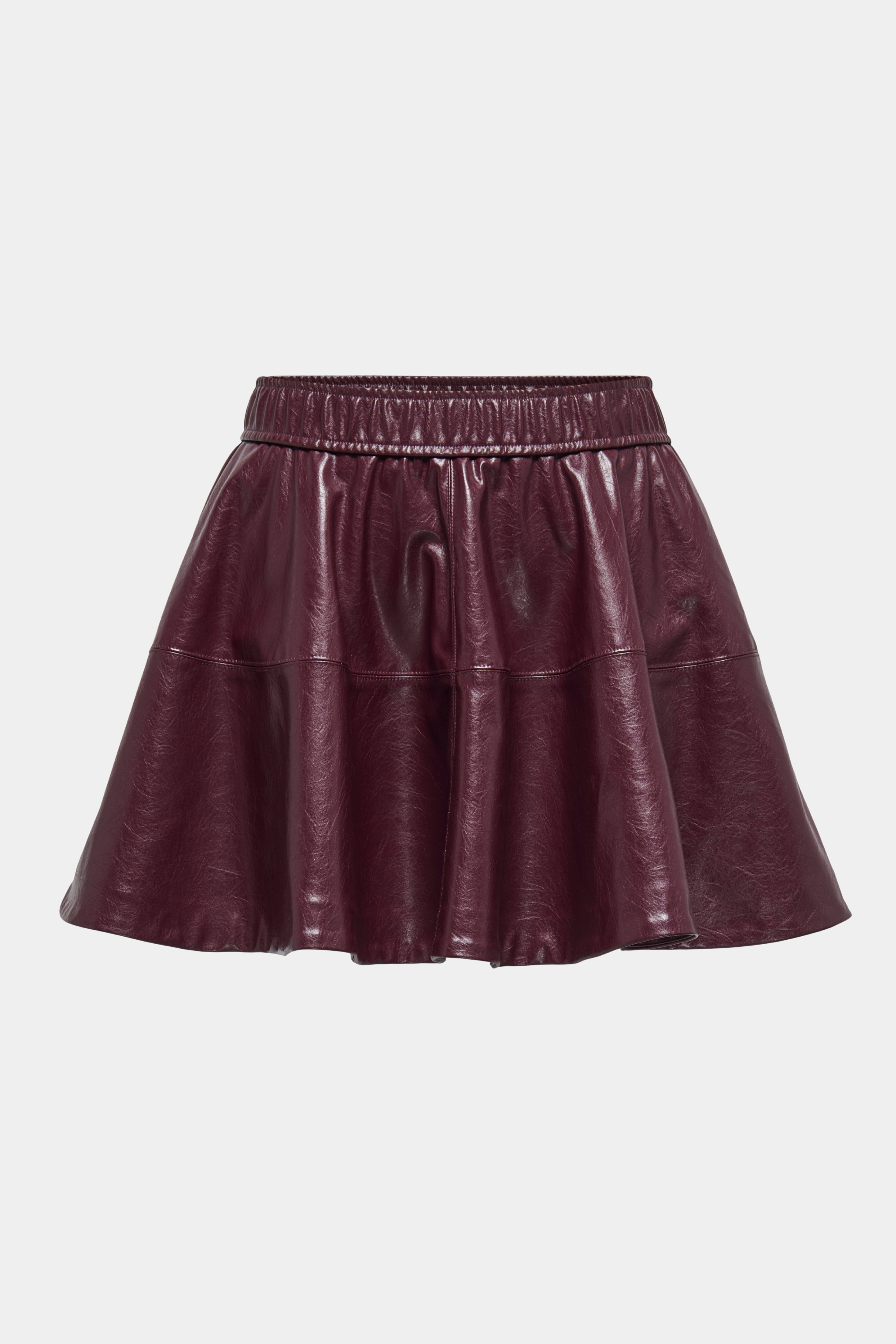 Fin, smuk, elegant, klassisk, staple, feminin, pæn, rå, cool, sej, unik, musthave, hverdag, fest, kvinde, dame, woman, nederdel, skirt, skater, skaterskirt, rød, bordeaux, wine, vinrød, mørkerød, a-shape, løs, loose, elastik, kort, short, midi, kunstlæder, kunstskind, faux